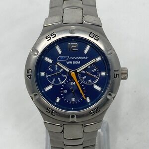 Reebok Watch Men 39mm Silver Tone Blue Dial Day Date WR 50M New Battery 8.25"
